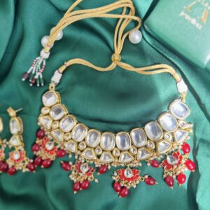 Bridal kundan set with red beads with earrings and maang tikka dark red colour